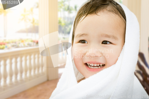 Image of Happy Cute Mixed Race Chinese and Caucasian Boy On Tropical Pati