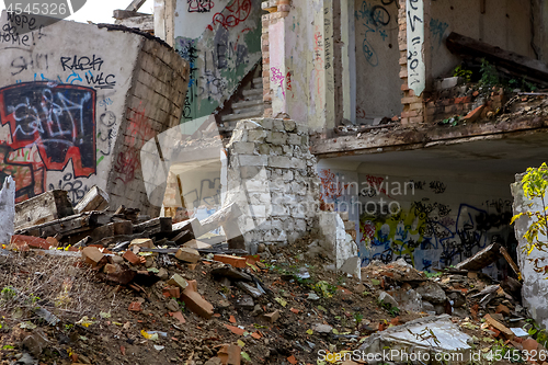 Image of Ruins of white bricks house.