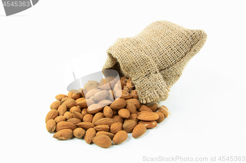 Image of Spilled Natural Whole Almonds. 