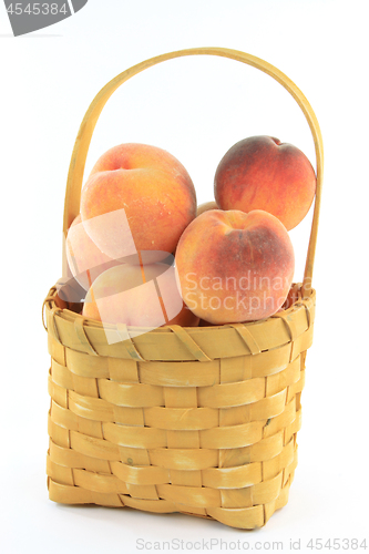 Image of Peaches in basket. 