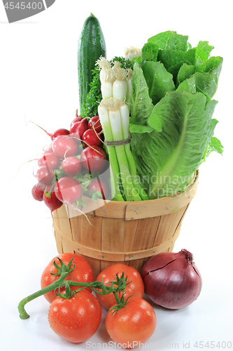 Image of Wodden Bushel full with Vegetables for Salad. 