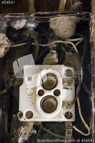 Image of Wiring problem? Old fuse box with spider webs, blowball seeds an