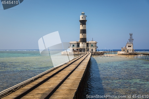 Image of Long pier with lighthouse at the end