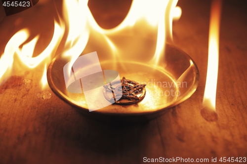 Image of Old pentagram burning in flames