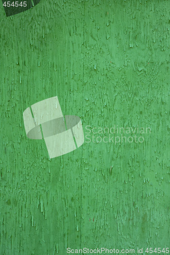 Image of rough wood background in intense green color