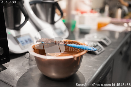 Image of chocolate cream in bowl at confectionery shop