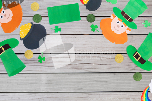 Image of st patricks day decorations on wooden background