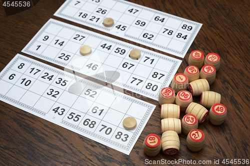 Image of cards and kegs for lotto game on the table