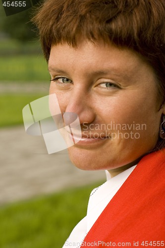 Image of redhead woman in red