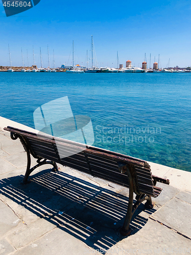 Image of old wooden bench in Rodos, Greece