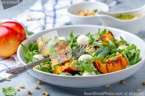 Image of Arugula salad with grilled nectarines.