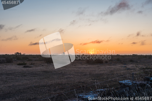 Image of Sunrise in a great plain pastureland