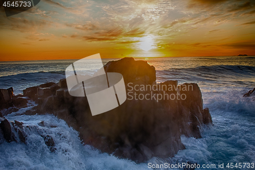 Image of Powerful Waves crushing on a rocky beach