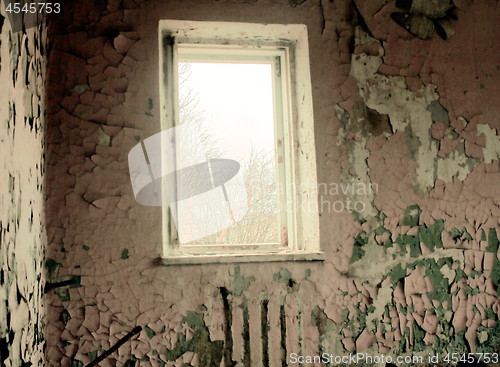 Image of sad old abandoned dilapidated house.