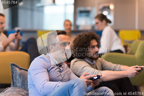 Image of startup Office Workers Playing computer games