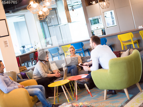 Image of Startup Business Team At A Meeting at modern office building