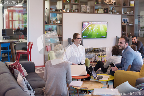 Image of Startup Business Team At A Meeting at modern office building