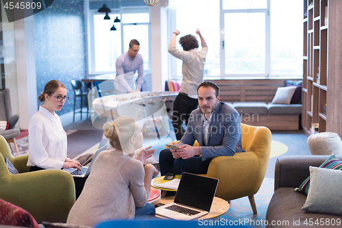 Image of Startup Business Team At A Meeting at modern office building