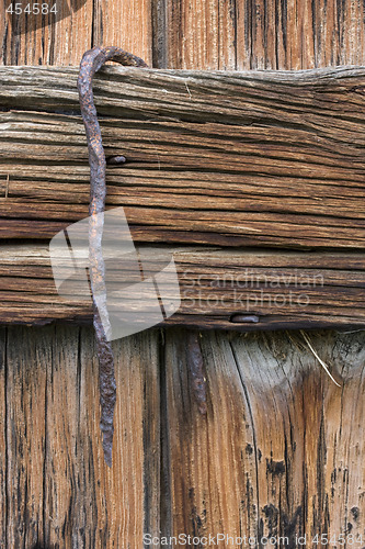 Image of weathered wood and rusty hook