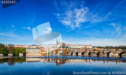 Image of Charles bridge over Vltava river and Gradchany (Prague Castle)