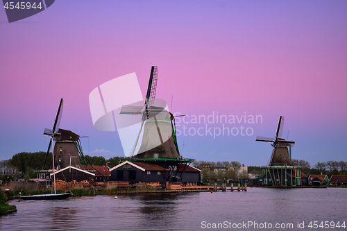 Image of Windmills at Zaanse Schans in Holland in twilight after sunset. 