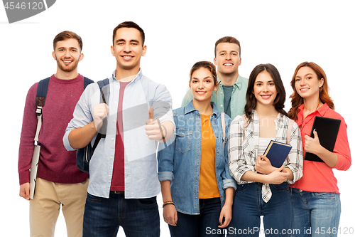 Image of group of smiling students showing thumbs up