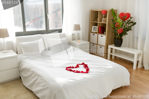 Image of cozy bedroom decorated for valentines day