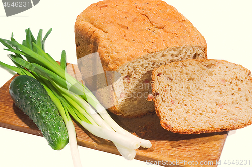 Image of bread and vegetables on a white background