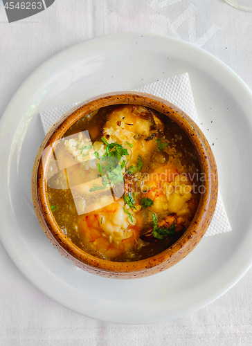 Image of bowl of garlic prawns