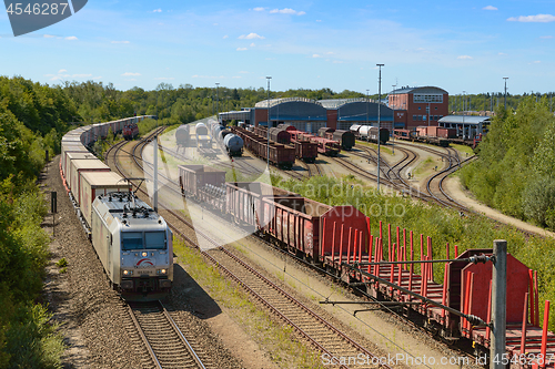 Image of Motive power locomotive depot with moving rolling stock