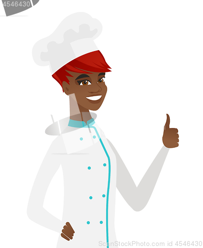 Image of Young african-american chef giving thumb up.