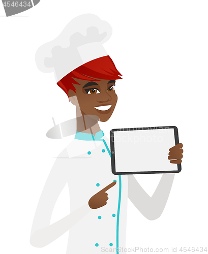 Image of Smiling chef cook holding tablet computer.