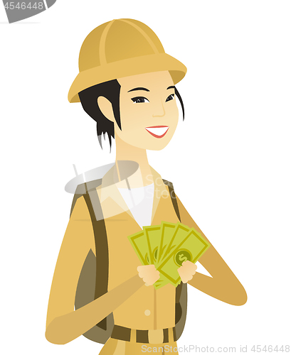 Image of Young asian traveler holding money.