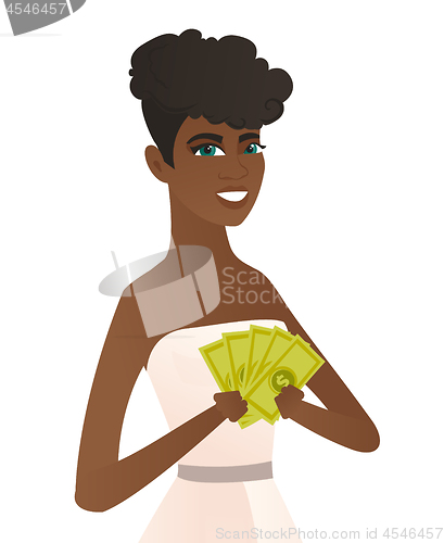 Image of Young african-american fiancee holding money.