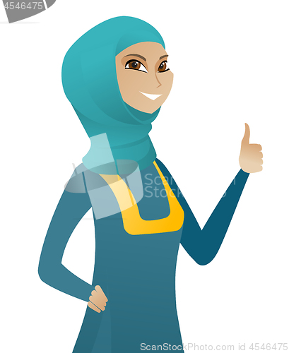 Image of Young muslim business woman giving thumb up.