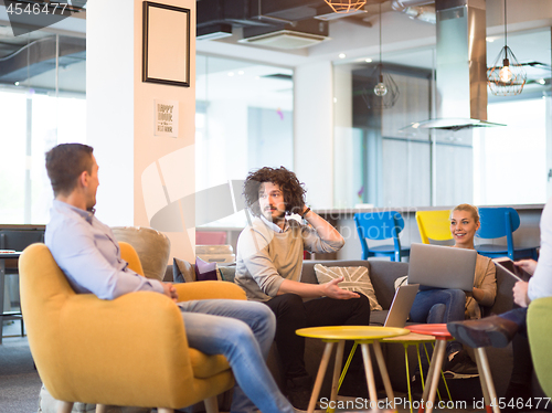 Image of Startup Business Team At A Meeting at modern office building