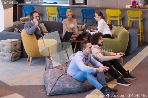 Image of startup Office Workers Playing computer games