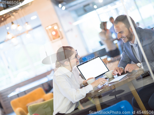 Image of startup Business team Working With laptop in creative office
