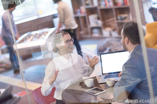 Image of startup Business team Working With laptop in creative office