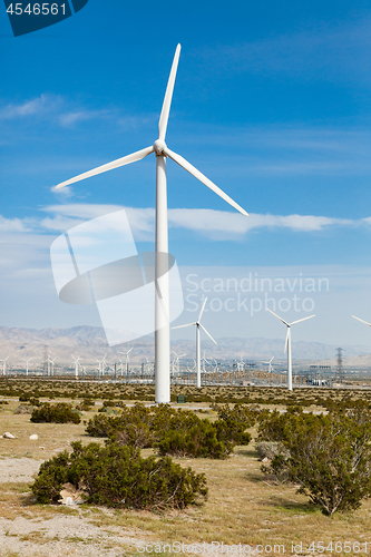 Image of Dramatic Wind Turbine Farm in the Desert of California.