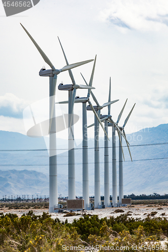 Image of Dramatic Wind Turbine Farm in the Desert of California.