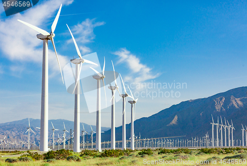 Image of Dramatic Wind Turbine Farm in the Desert of California.