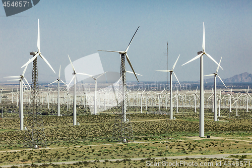 Image of Dramatic Wind Turbine Farm in the Desert of California.