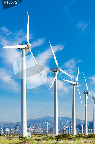 Image of Dramatic Wind Turbine Farm in the Desert of California.