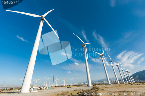 Image of Dramatic Wind Turbine Farm in the Desert of California.