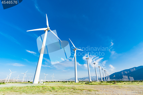 Image of Dramatic Wind Turbine Farm in the Desert of California.