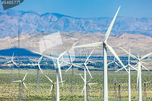 Image of Dramatic Wind Turbine Farm in the Desert of California.