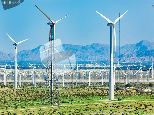 Image of Dramatic Wind Turbine Farm in the Desert of California.