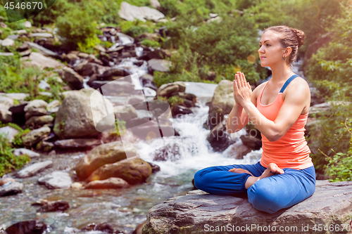 Image of Woman in Padmasana outdoors