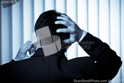Image of Stressed businessman